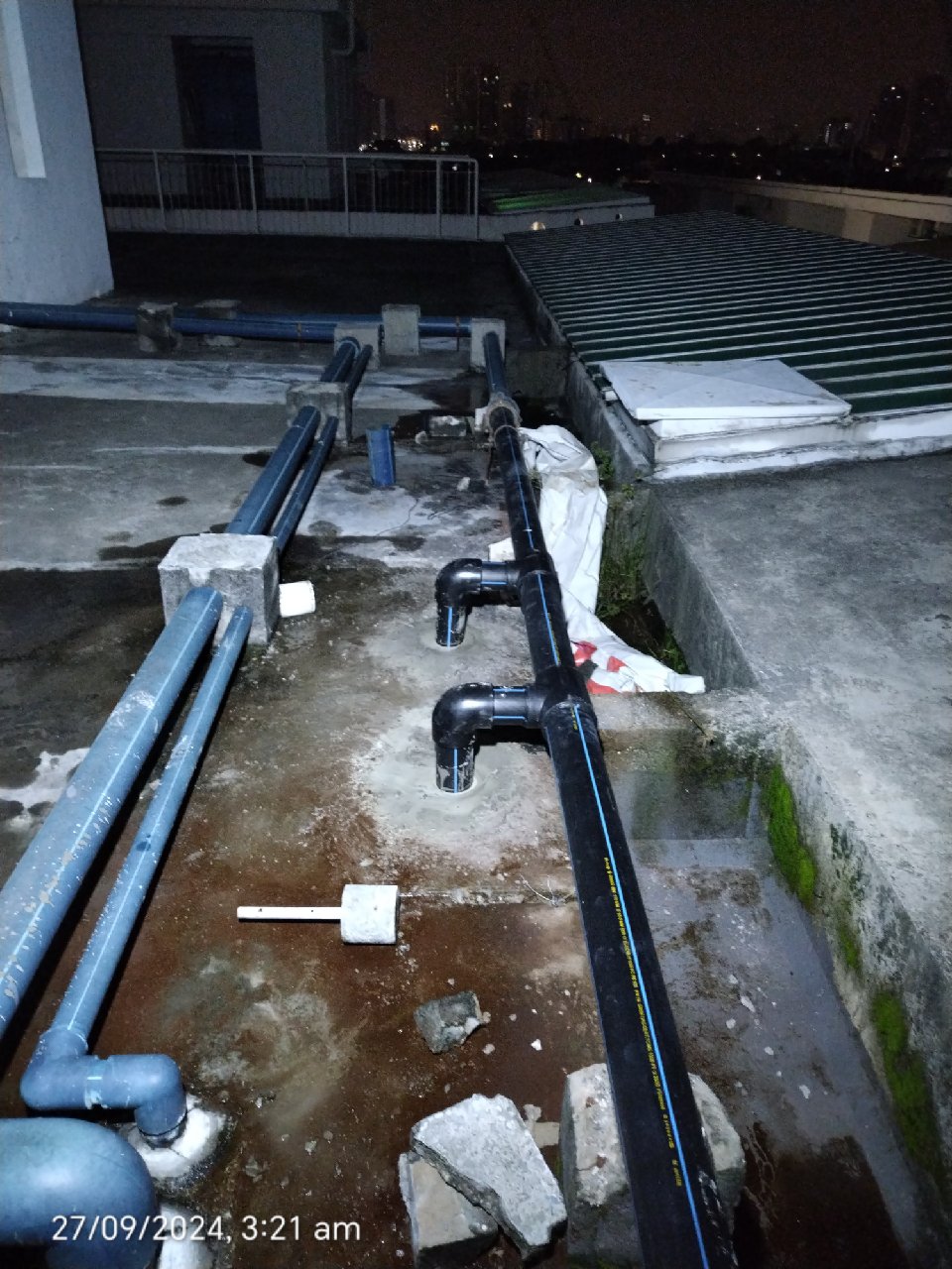 Rooftop pipe installation at 10 Boulevard